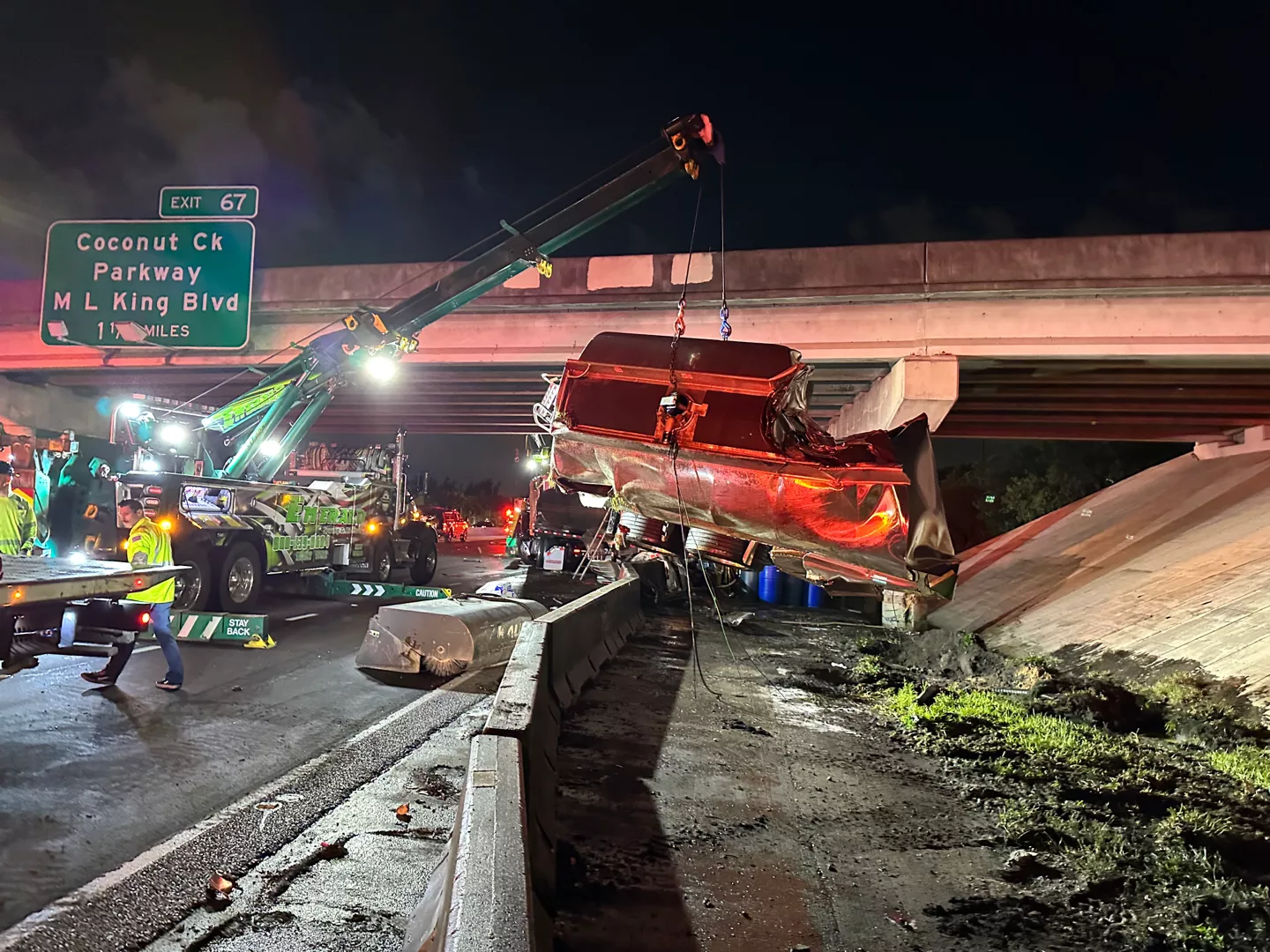 Services-Heavy-Duty-Towing Emerald Transportation truck rescuing overturned truck